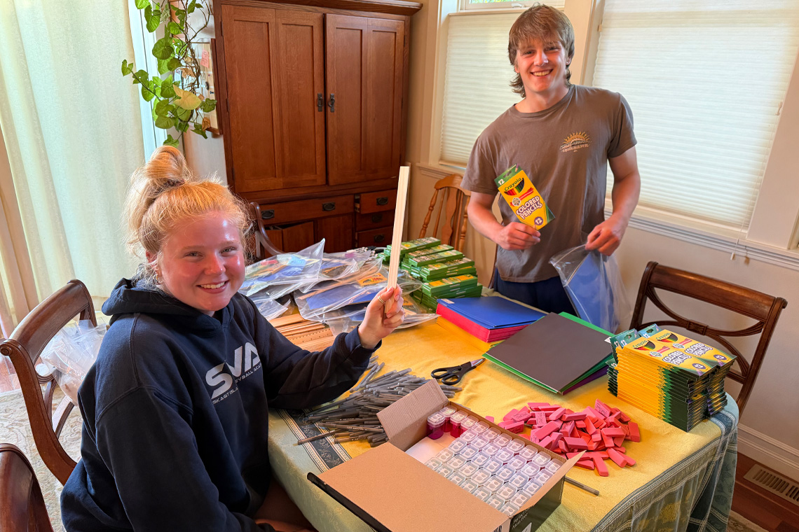 AHS alum Ava and Wesley, both UW students, doing their part to give back to their community by putting together backpack supply kits. AHS alum Ava and Wesley, both UW students, doing their part to give back to their community by putting together backpack supply kits.